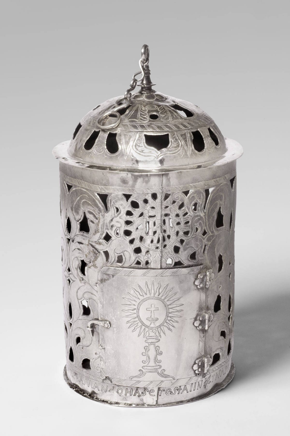 An ornate silver lantern of Peruvian origin, dated 1738